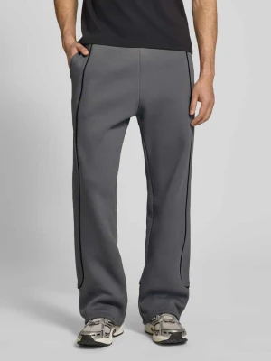 spodnie dresowe z elastycznym pasem i logo REVIEW