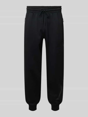 Spodnie dresowe z elastycznym pasem i tunelem adidas Sportswear