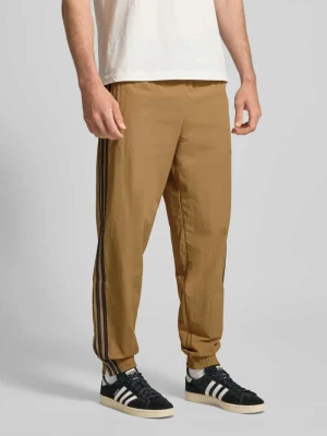 Spodnie dresowe z elastycznym ściągaczem adidas Originals