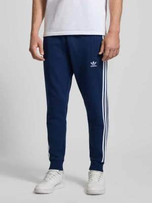 Spodnie dresowe z elastycznym ściągaczem adidas Originals