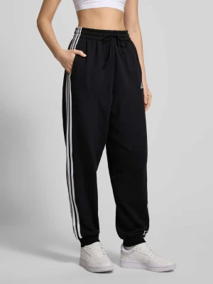 Spodnie dresowe z elastycznym ściągaczem adidas Sportswear