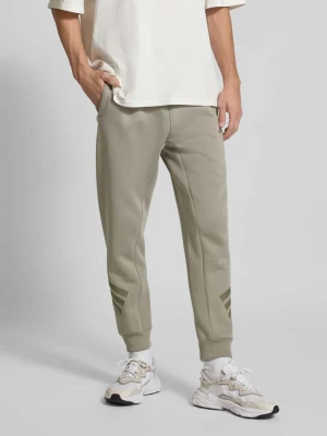 Spodnie dresowe z elastycznym ściągaczem adidas Sportswear
