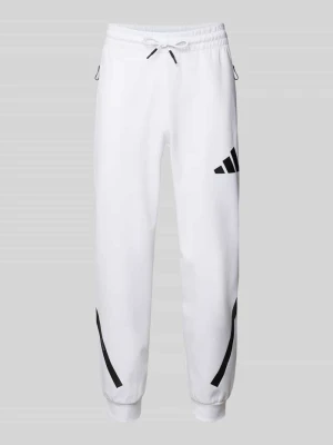 Spodnie dresowe z elastycznym ściągaczem adidas Sportswear