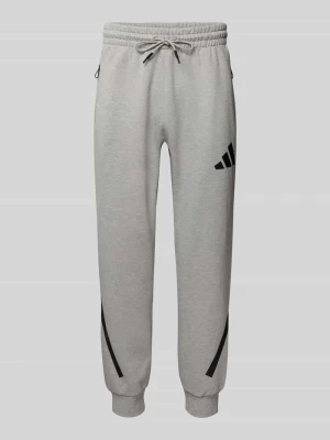 Spodnie dresowe z elastycznym ściągaczem adidas Sportswear