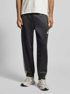 Spodnie dresowe z elastycznym ściągaczem adidas Sportswear