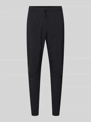 Spodnie dresowe z elastycznym ściągaczem adidas Sportswear