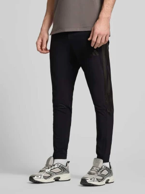 Spodnie dresowe z elastycznym ściągaczem adidas Sportswear