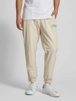 Spodnie dresowe z elastycznym ściągaczem Karl Kani