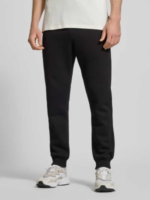 Spodnie dresowe z elastycznym ściągaczem REVIEW