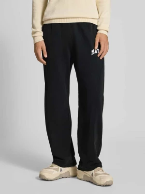 Spodnie dresowe z elastycznym ściągaczem Review X MATW