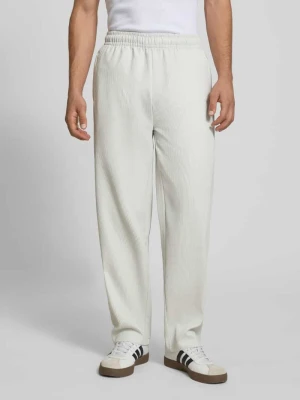 Spodnie dresowe z fakturowanym wzorem i elastycznym pasem Pegador