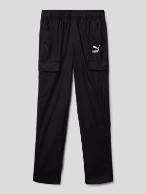 Spodnie dresowe z kieszeniami z patką model ‘CLASSICS Woven Pants’ Puma