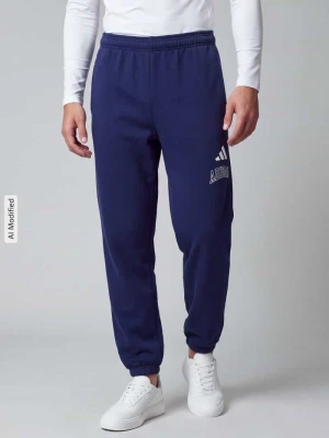 Spodnie dresowe z nadrukiem z logo Adidas Ciemnoniebieski