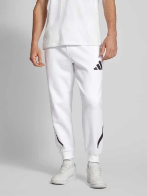 Spodnie dresowe z nadrukiem z logo adidas Sportswear