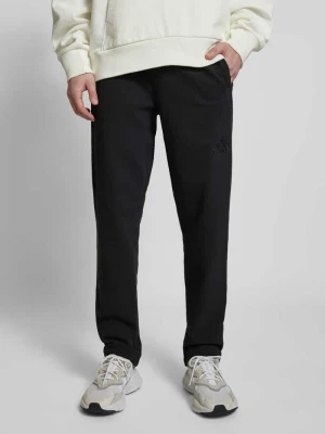 Spodnie dresowe z nadrukiem z logo adidas Sportswear