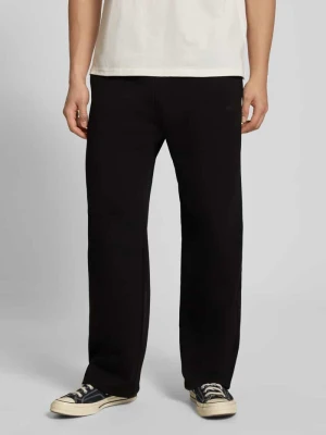 Spodnie dresowe z nadrukiem z logo i kieszenią z tyłu REVIEW