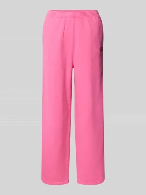 Spodnie dresowe z nadrukiem z logo model ‘PLIZZY’ American vintage