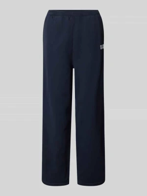 Spodnie dresowe z nadrukiem z logo model ‘PLIZZY’ American vintage