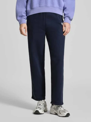 Spodnie dresowe z nadrukiem z logo model ‘PLIZZY’ American vintage