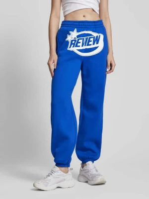 Spodnie dresowe z nadrukiem z logo Review