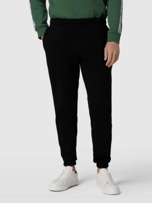 Spodnie dresowe z paskami z logo model ‘TAPE’ Lacoste