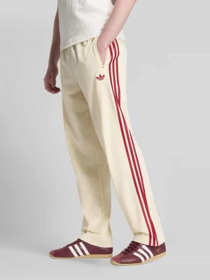 Spodnie dresowe z paski w kontrastowym kolorze model 'FIREBIRD TT' adidas Originals