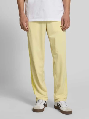 Spodnie dresowe z prostą nogawką i elastycznym pasem model ‘FIREBIRD’ adidas Originals