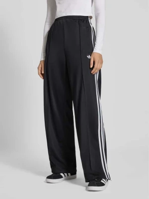 Spodnie dresowe z szeroką nogawką i ozdobnymi szwami model ‘FIREBIRD’ adidas Originals