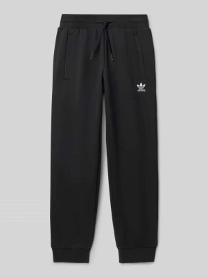 Spodnie dresowe z wyhaftowanym logo i elastycznym pasem adidas Originals