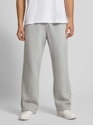 Spodnie dresowe z wyhaftowanym logo i elastycznym pasem adidas Originals