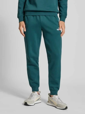 Spodnie dresowe z wyhaftowanym logo i elastycznym pasem PUMA PERFORMANCE