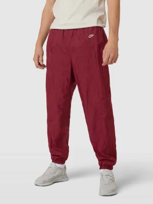 Spodnie dresowe z wyhaftowanym logo model ‘CIRCA’ Nike