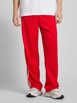 Spodnie dresowe z wyhaftowanym logo model ‘FIREBIRD’ adidas Originals