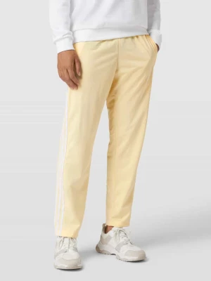 Spodnie dresowe z wyhaftowanym logo model ‘STRAIGHT’ adidas Originals