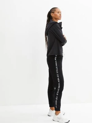 Spodnie dresowe ze ściągaczem w talii i u dołu nogawek z napisem bonprix