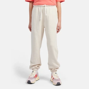 Spodnie dziecięce New Balance LAKG0058LIN – beżowe