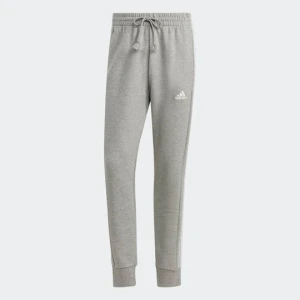 Spodnie Essentials French Terry Tapered Cuff 3-Stripes Adidas
