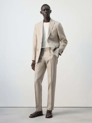 Spodnie garniturowe Amalfi slim fit z 100% lnu beżowy - Mężczyzna - - MANGO MAN