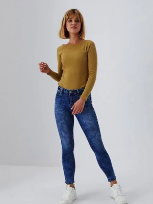 Spodnie jeansowe damskie z efektem sprania Moodo
