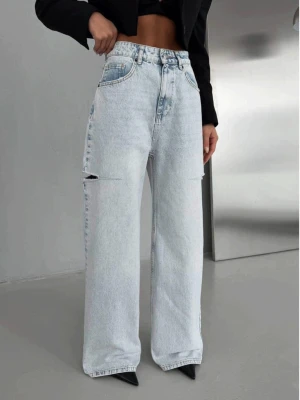 Spodnie jeansy z szerokimi nogawkami MORIKO - jasny jeans  magmac 
