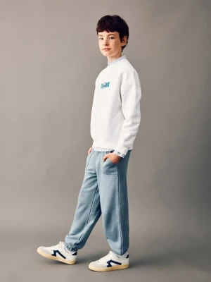 Spodnie jogger z bawełny niebieski - Dzieci - - MANGO KIDS