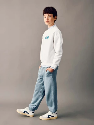 Spodnie jogger z bawełny niebieski - Dzieci - - MANGO KIDS