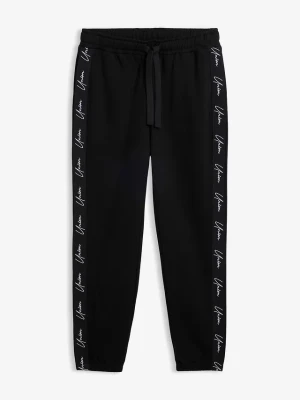 Spodnie joggingowe z czystej bawełny organicznej o kroju loose fit BonPrix czarny