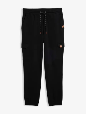 Spodnie joggingowe z kieszeniami cargo z czystej bawełny organicznej BonPrix czarny