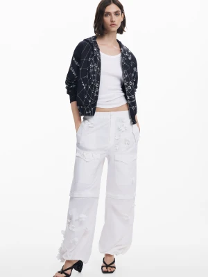 Spodnie konwertowalne w kwiaty Tyler McGillivary Desigual