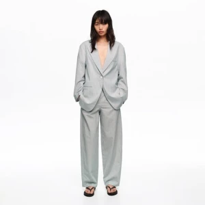 Spodnie len zaszewki paski jasnoniebieskie BIMBA Y LOLA LIGHT GREY