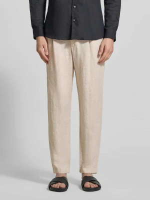 Spodnie lniane o kroju tapered fit z wpuszczanymi kieszeniami MCNEAL