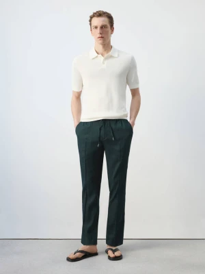 Spodnie lniane slim fit z troczkami ciemnozielony - Mężczyzna - - MANGO MAN