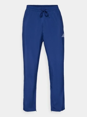 Spodnie materiałowe Adidas granatowy