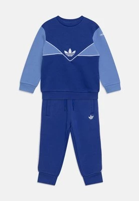 Spodnie materiałowe adidas Originals